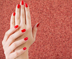 Сlipart Woman hands on red background nail red hand closeup   BillionPhotos