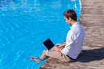 Сlipart Laptop Swimming Pool Outdoors Relaxation Businessman photo  BillionPhotos