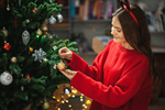 Сlipart Little girl decorating kid tree decoration trimming photo  BillionPhotos