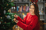 Сlipart Little girl decorating kid tree decoration trimming photo  BillionPhotos
