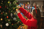 Сlipart Little girl decorating kid tree decoration trimming photo  BillionPhotos