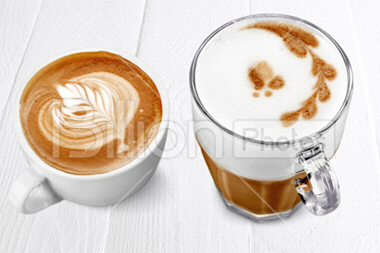 Cup of tea with milk / Coffee milk in glass cup with clipping path