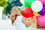 Сlipart Woman holding balloons in the park Celebration Balloon Party Women photo  BillionPhotos